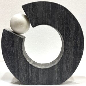 Black Marble Object with White Marble Ball
